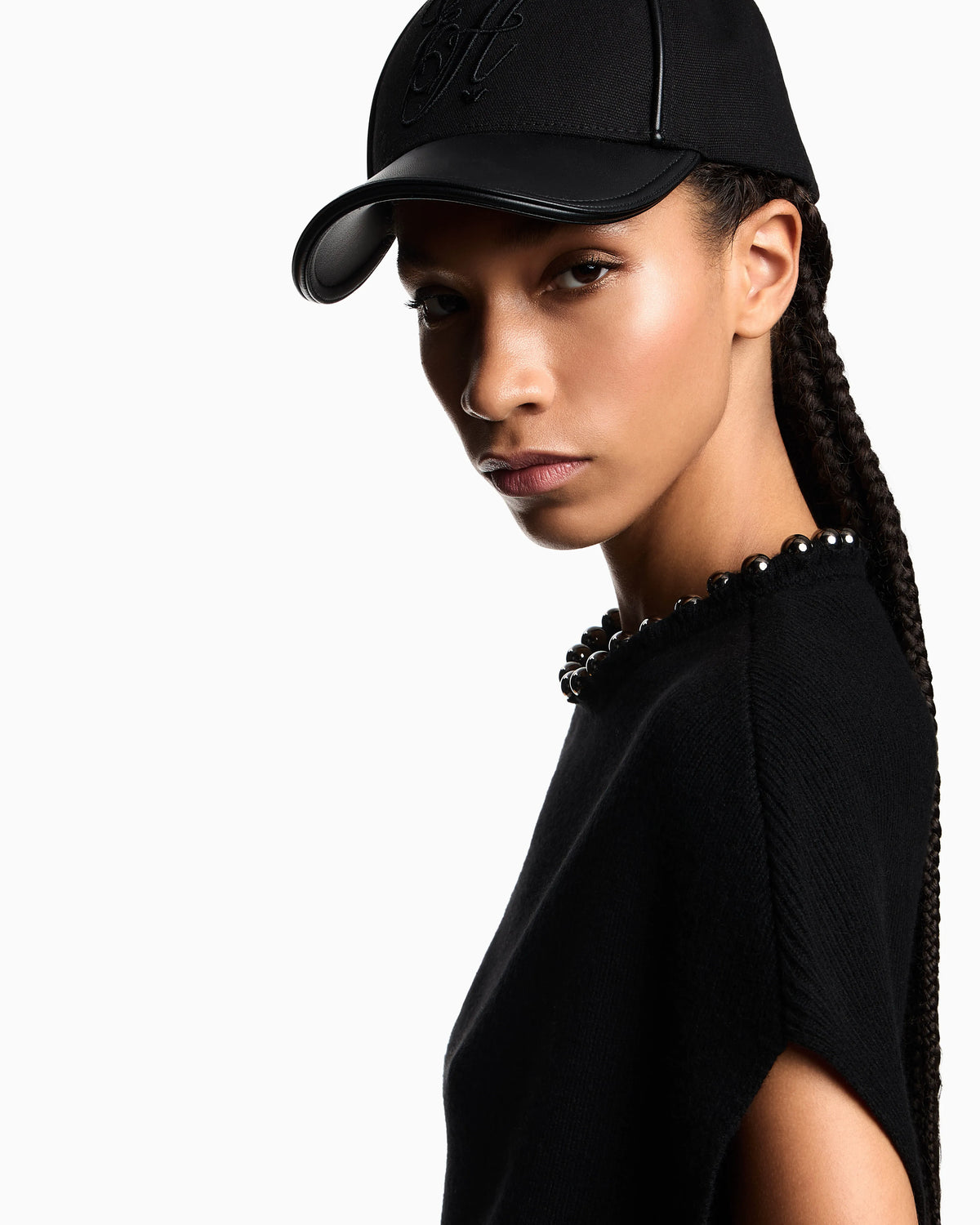 Virgin wool and cashmere top with oversized metal spheres