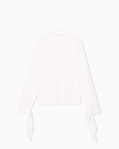 Blouse in recycled crepe with high neckline and tie cuffs