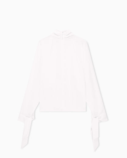Blouse in recycled crepe with high neckline and tie cuffs