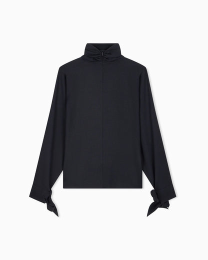 Blouse in recycled crepe with high neckline and tie cuffs