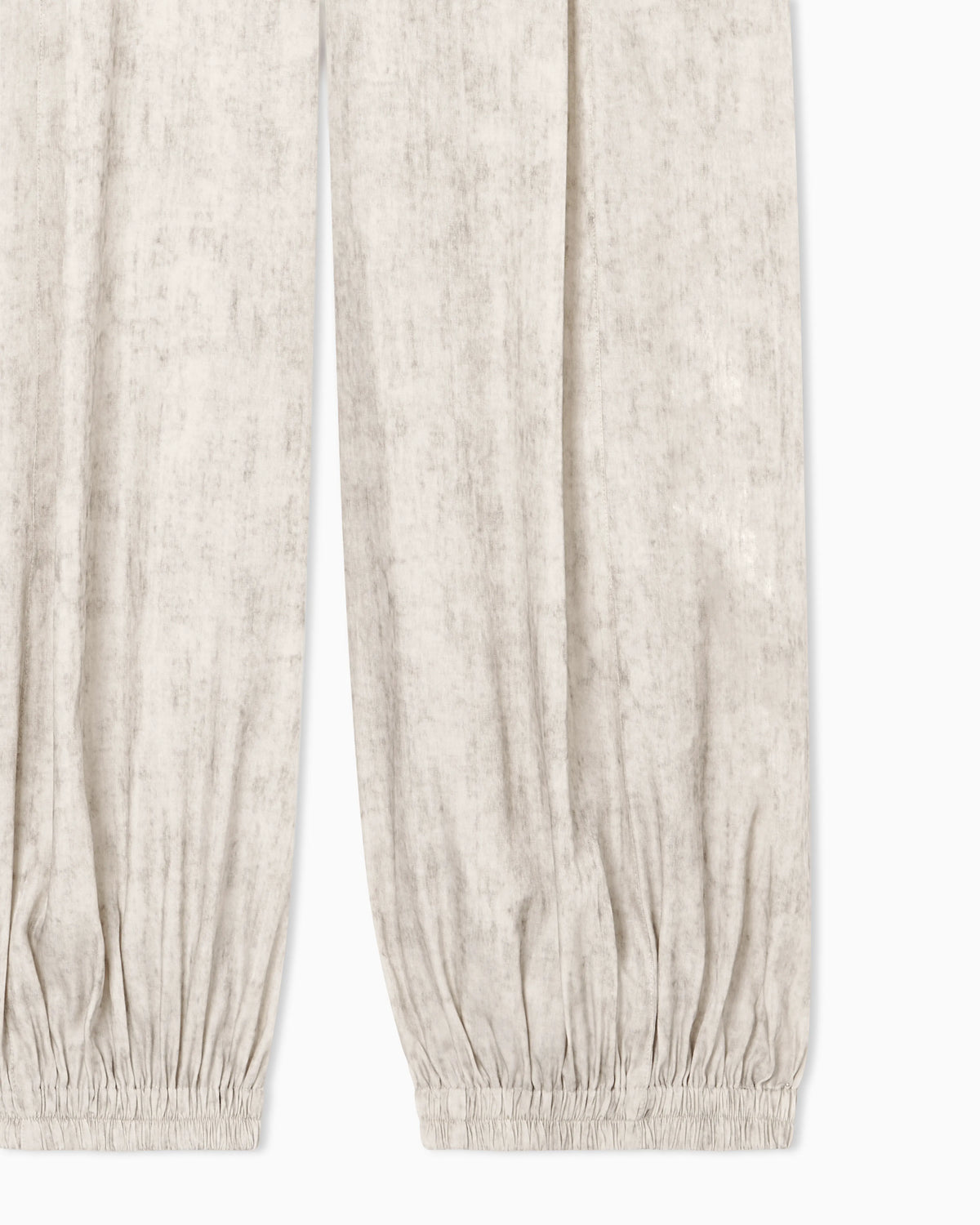 Flowing fabric trousers with a mottled-effect print