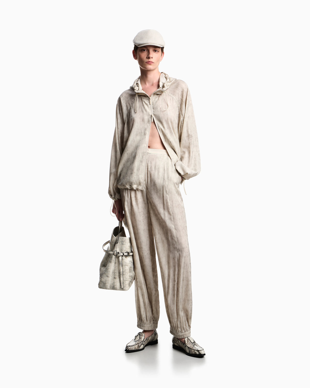 Flowing fabric trousers with a mottled-effect print