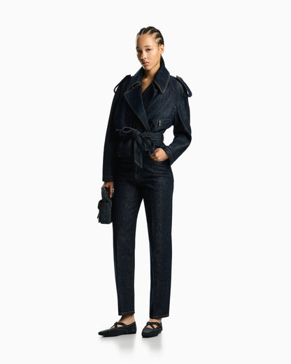 Five-pocket denim jeans with a metal knot on the waistband