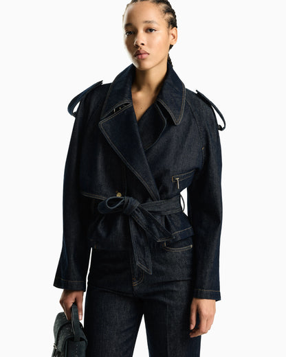 Five-pocket denim jeans with a metal knot on the waistband