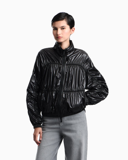 Reversible blouson jacket with matte and shiny finishes