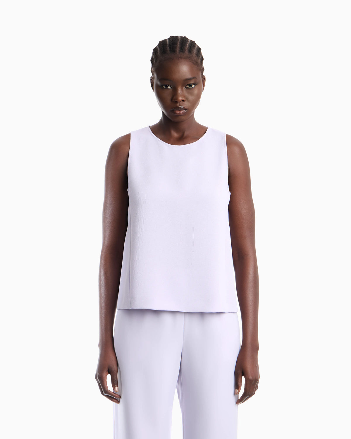 Textured sleeveless top with round neckline and back zip