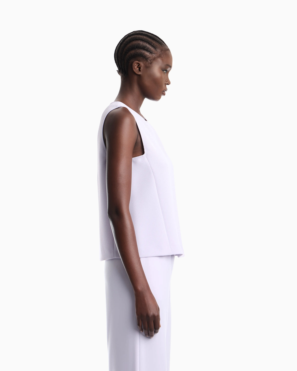 Textured sleeveless top with round neckline and back zip