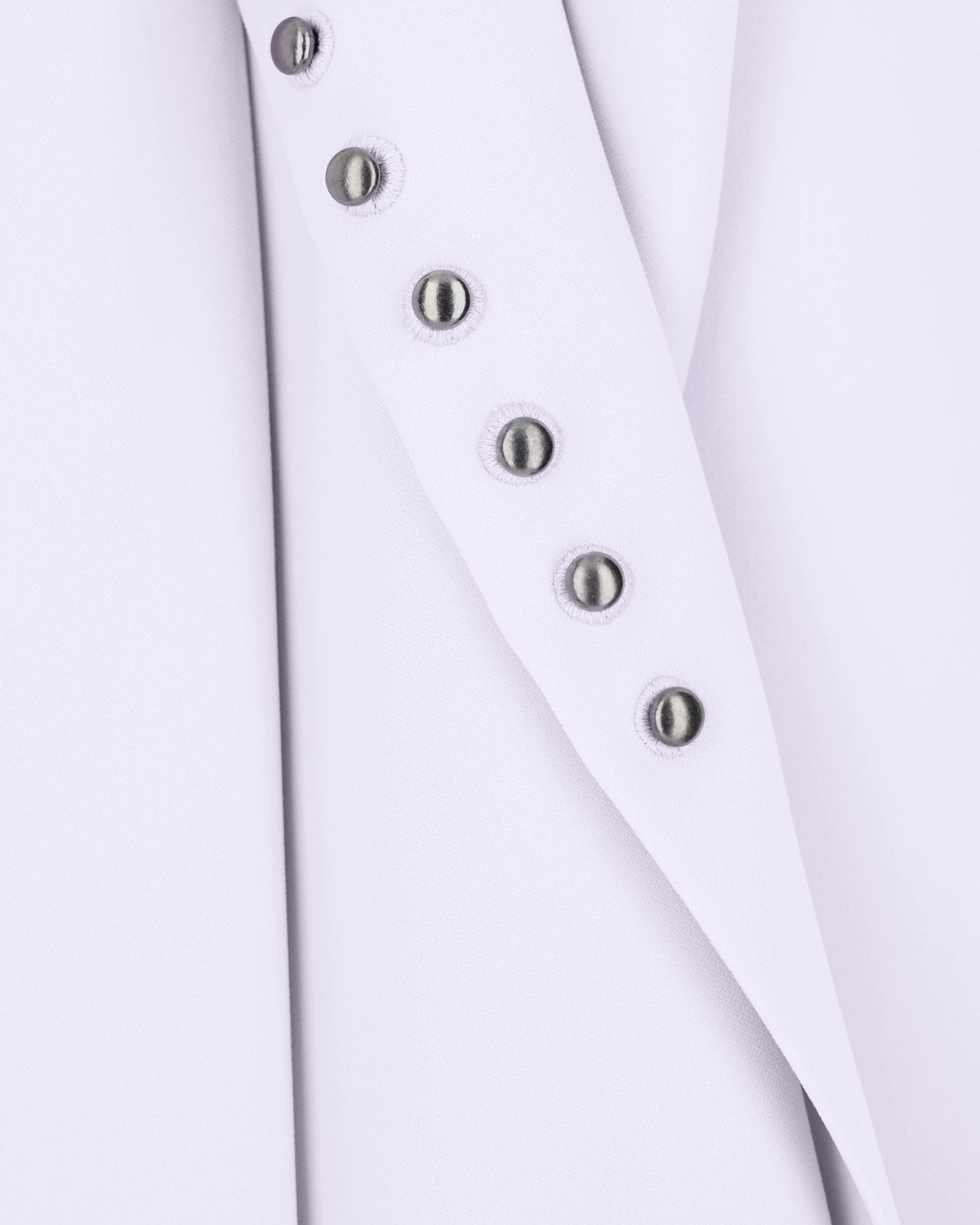 Unlined top in techno cady with stud rivets and buttonholes