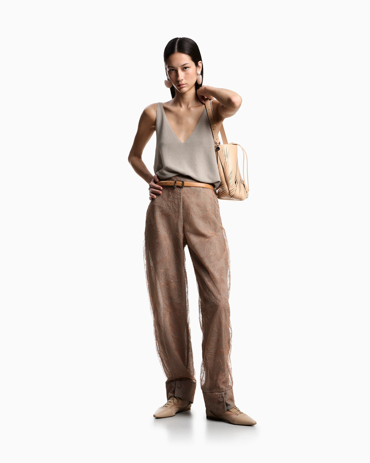 Tulle trousers embroidered with an embossed lurex flowers pattern