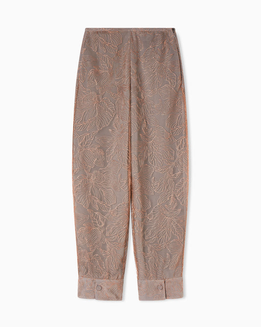 Tulle trousers embroidered with an embossed lurex flowers pattern