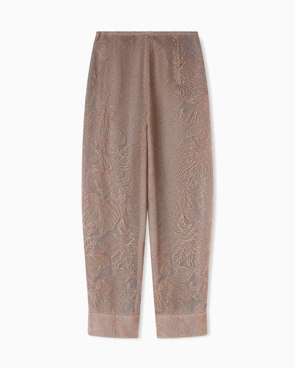Tulle trousers embroidered with an embossed lurex flowers pattern