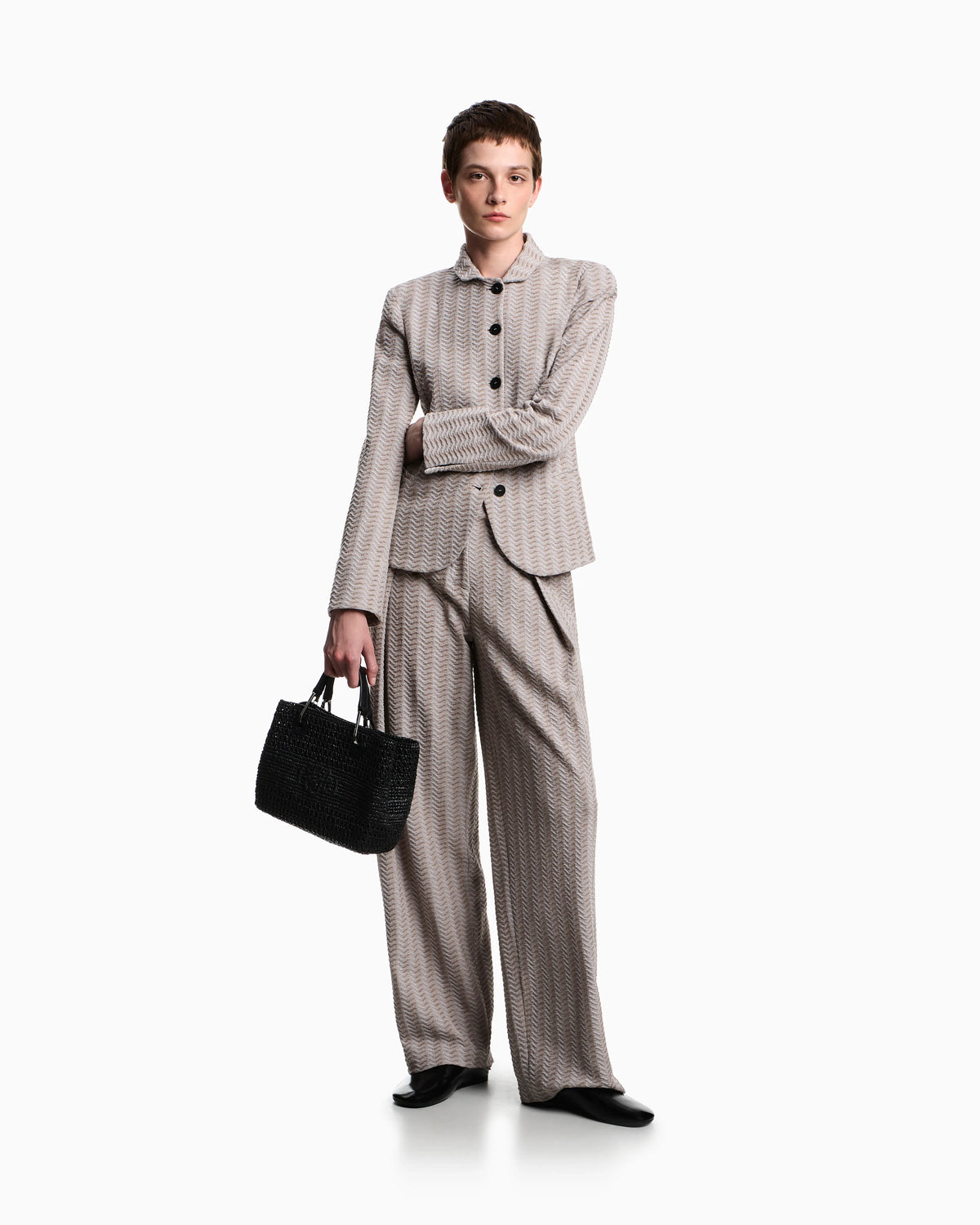 Jacquard jersey knit jacket with an embossed wave design