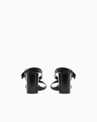 Shiny polished leather sandals with heel