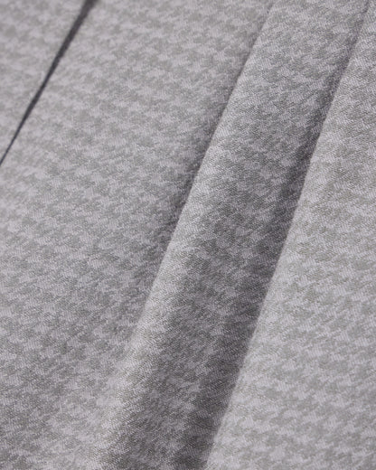 High-waisted trousers in houndstooth viscose and wool