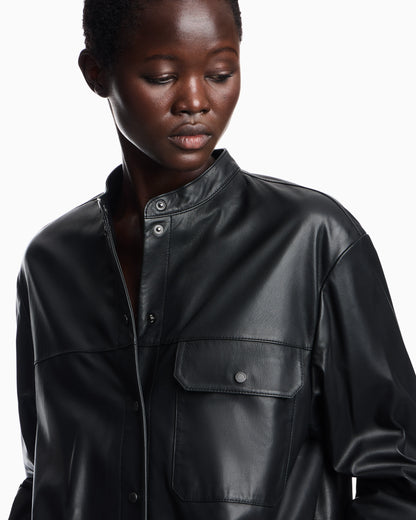 Leather shirt with stand-up collar and snap buttons