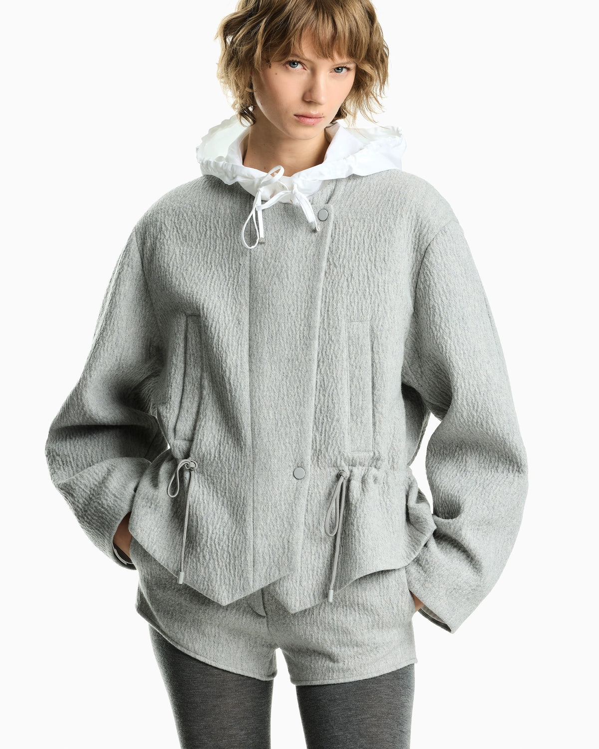 Wool seersucker blouson with a drawstring hood and pockets