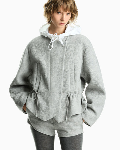 Wool seersucker blouson with a drawstring hood and pockets