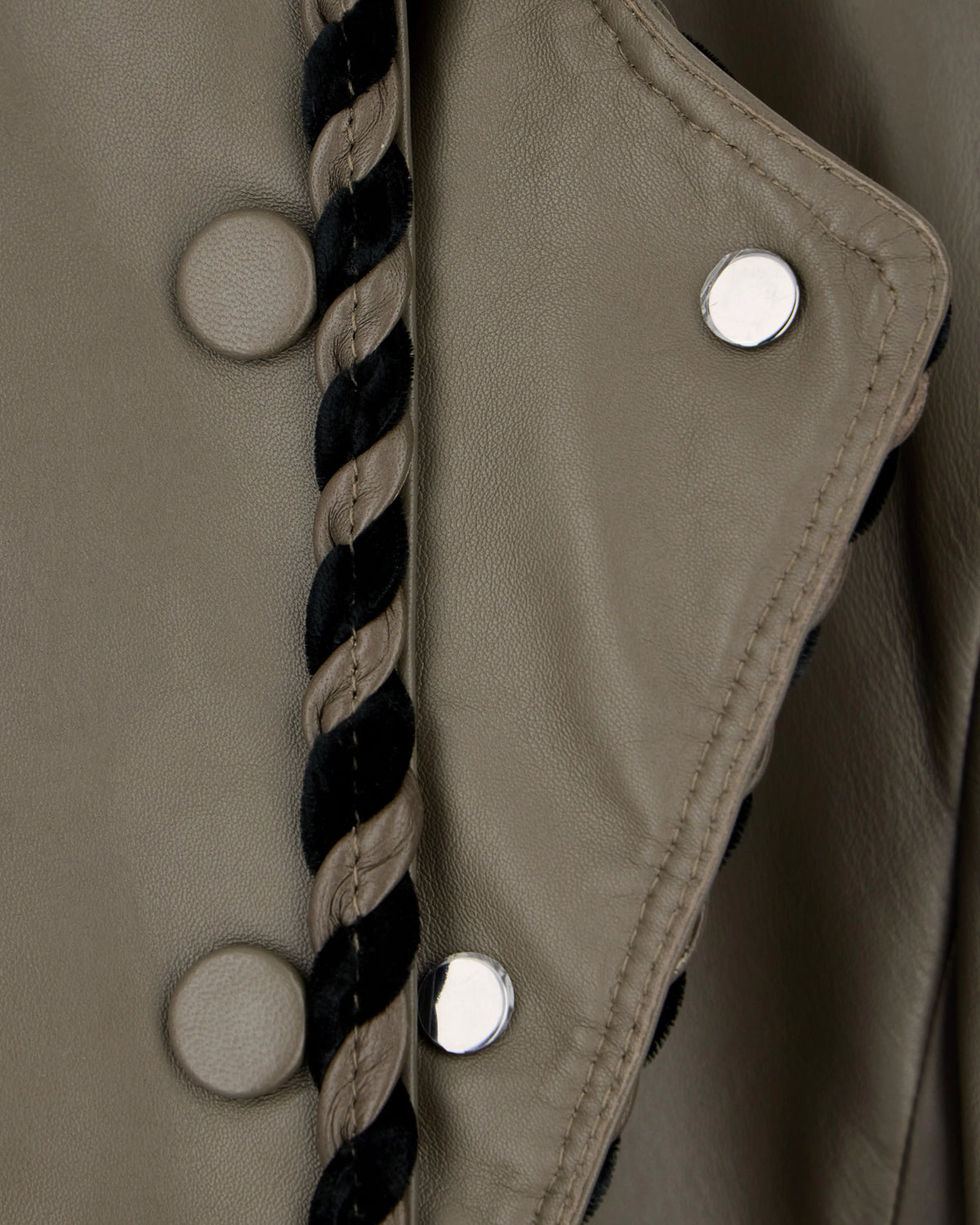 Cropped leather jacket with braided trim and button closure