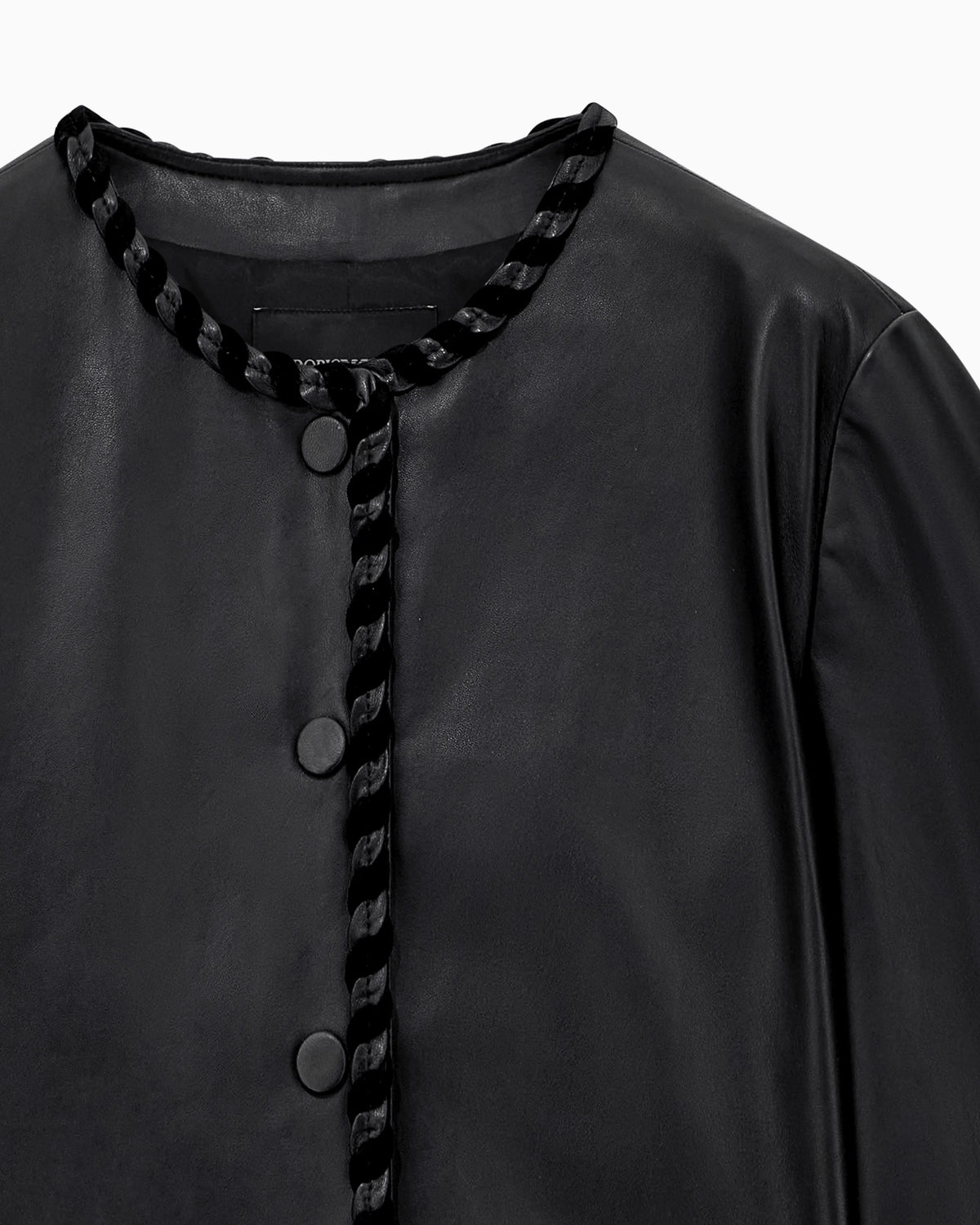 Cropped leather jacket with braided trim and button closure
