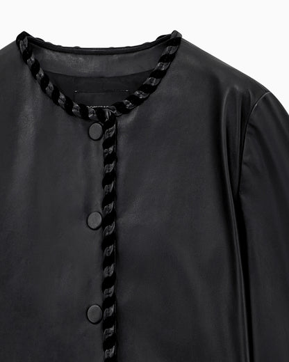Cropped leather jacket with braided trim and button closure