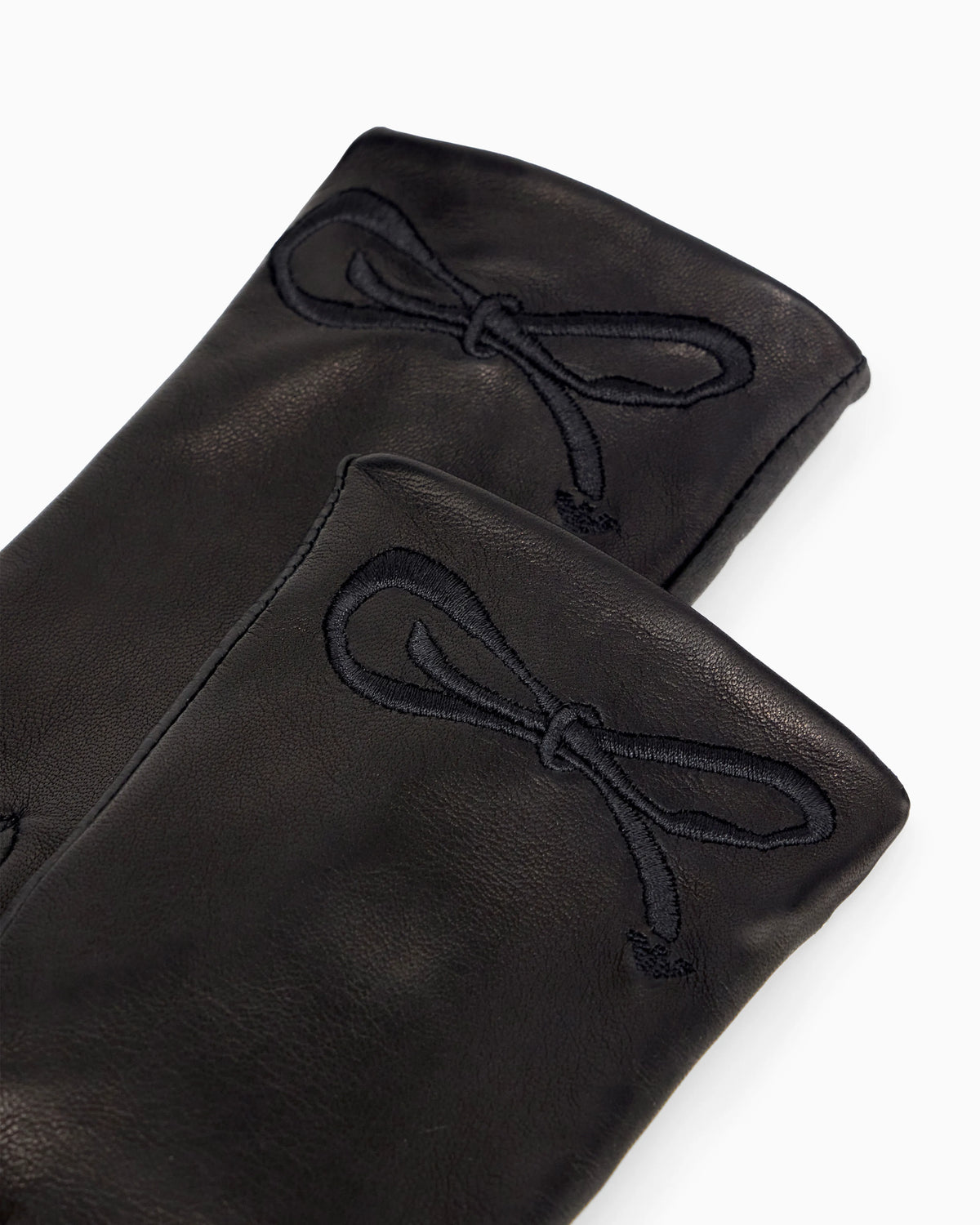 Gloves in nappa leather with embroidered bow and silk lining