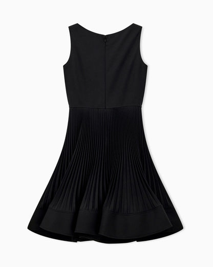 Dress in technical fabric with a pleated skirt