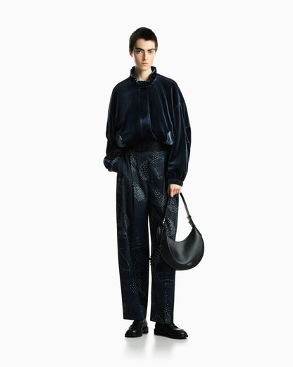 Wide-leg pleated creponne trousers with a floral dot print