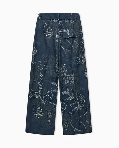 Wide-leg pleated creponne trousers with a floral dot print