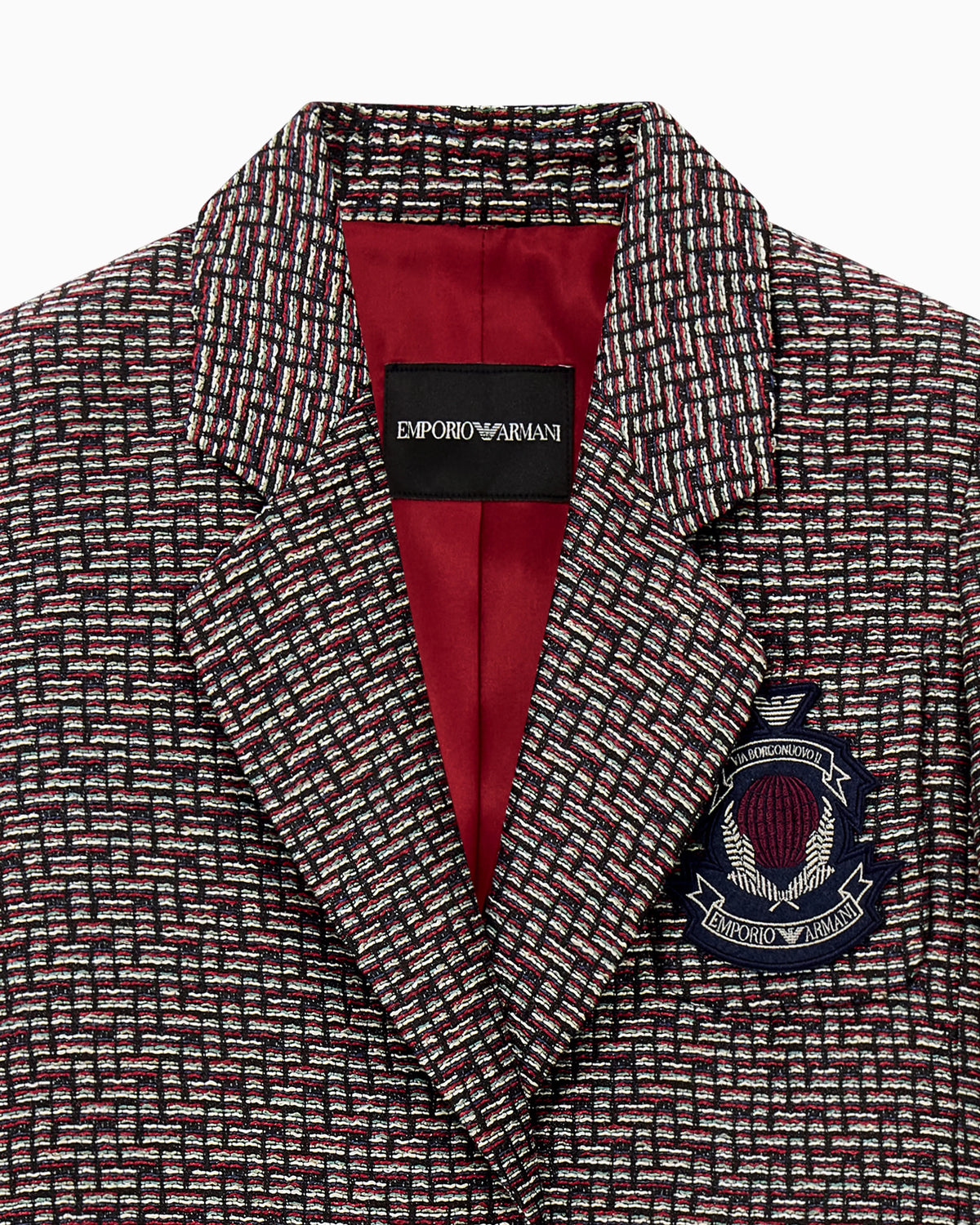 Basket weave lurex blazer with an embroidered chest crest