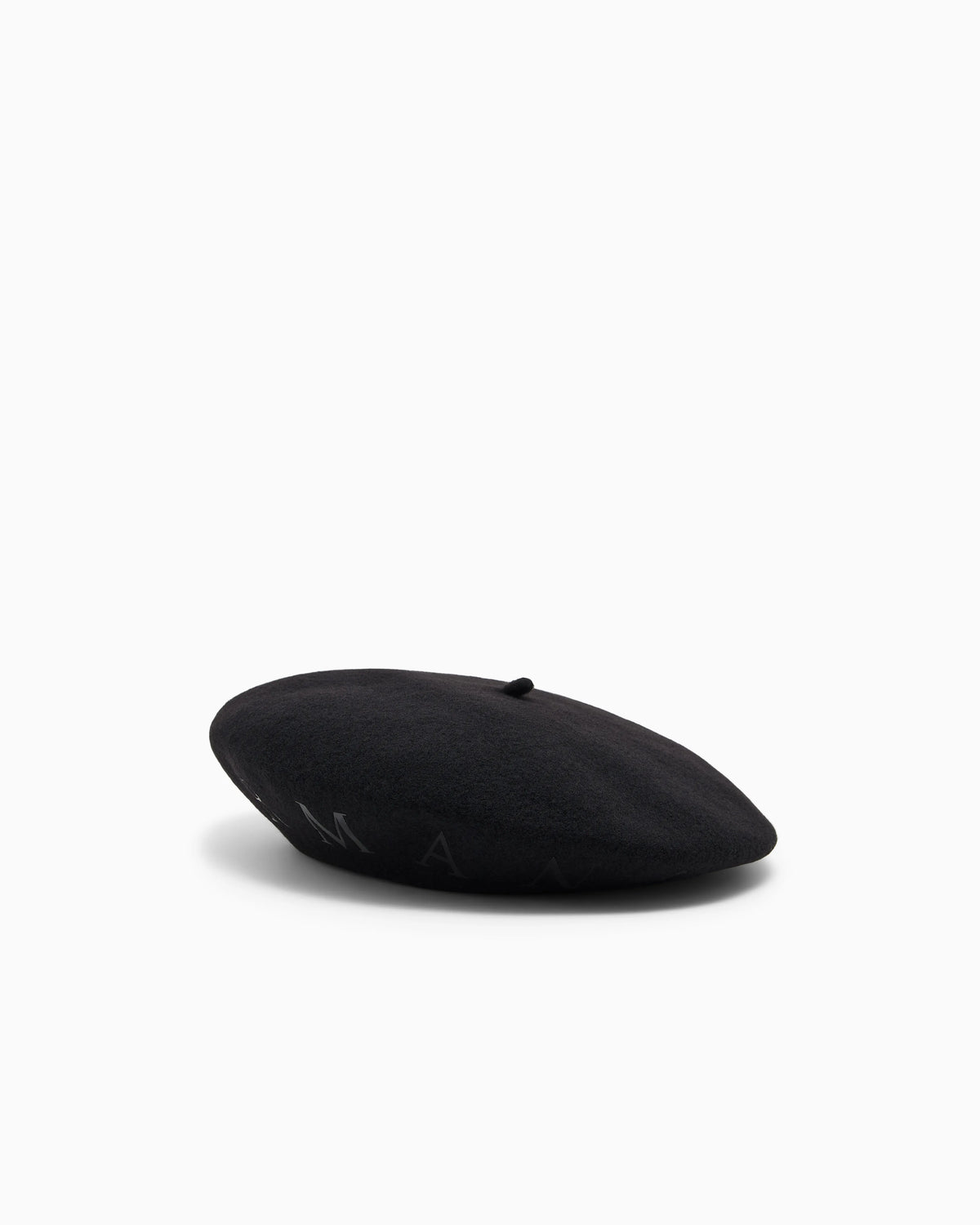 Beret hat with metallic studs around the edge
