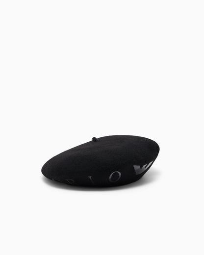 Beret hat with metallic studs around the edge