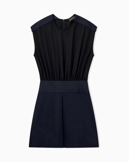 Sleeveless dress with a gathered bodice and front pleat