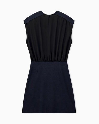 Sleeveless dress with a gathered bodice and front pleat
