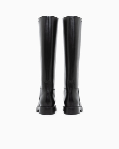 Leather knee-high boots with a round toe and low heel