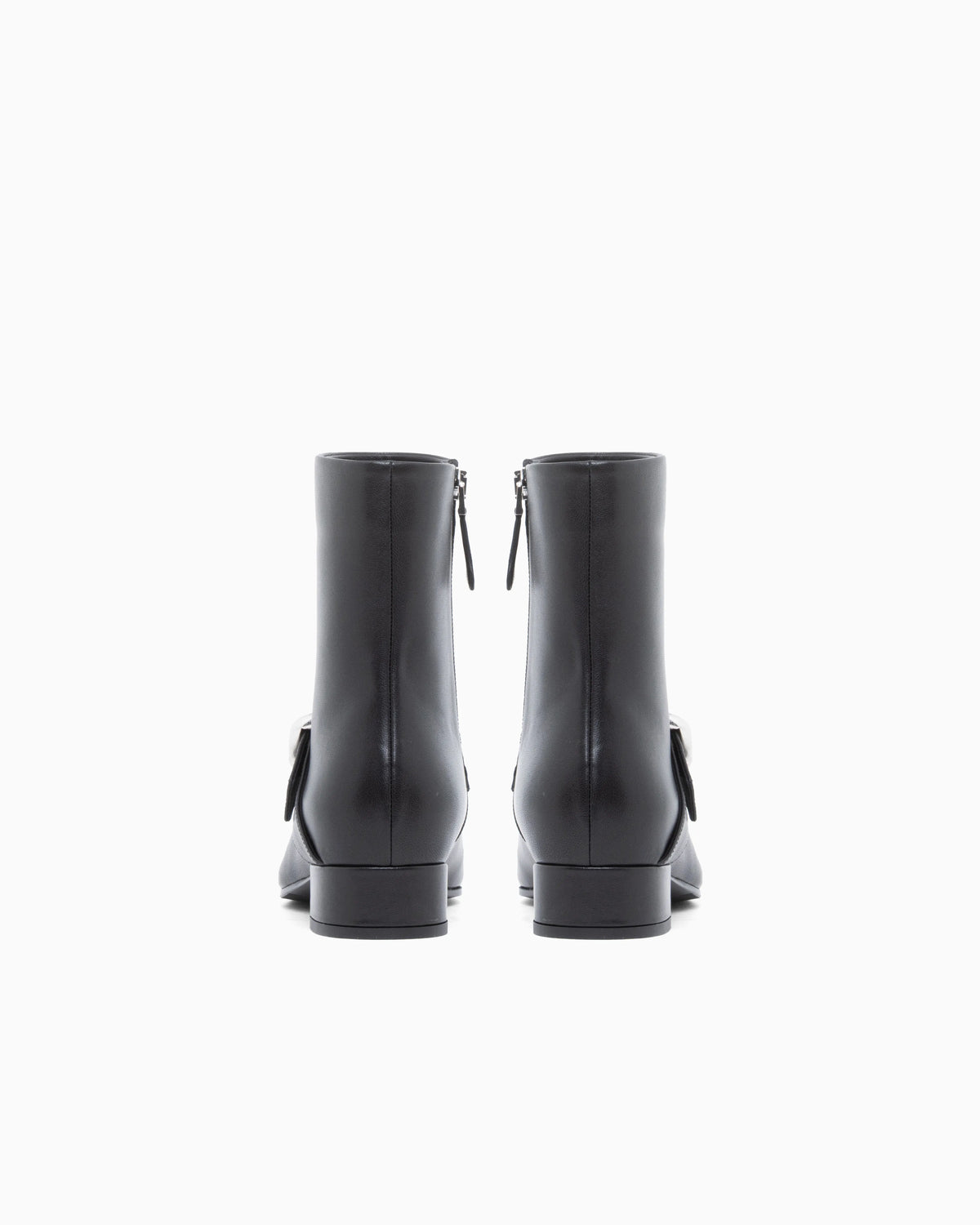 Nappa leather ankle boots with a side zip and metal buckle