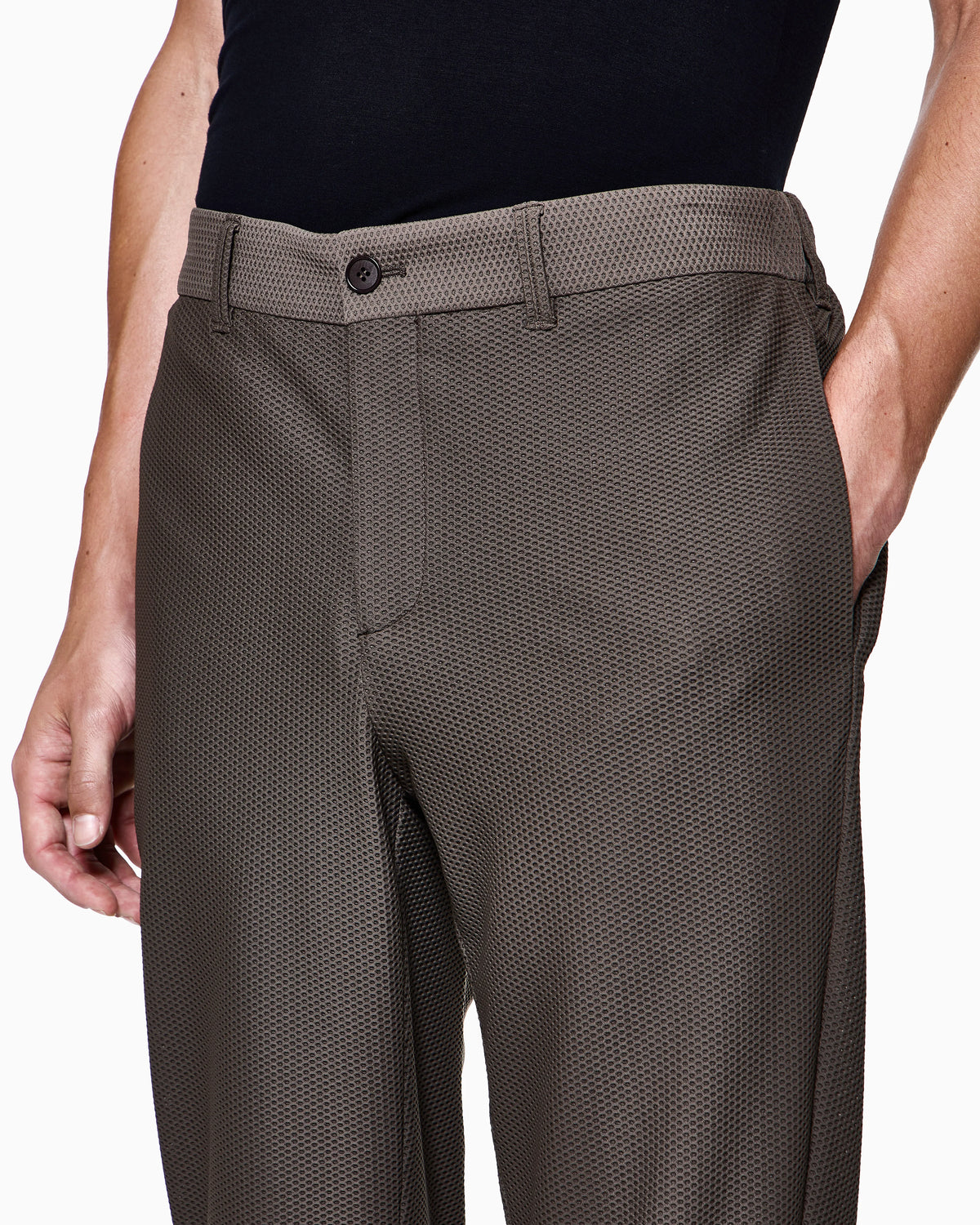Flat front trousers in a technical gaufré honeycomb fabric