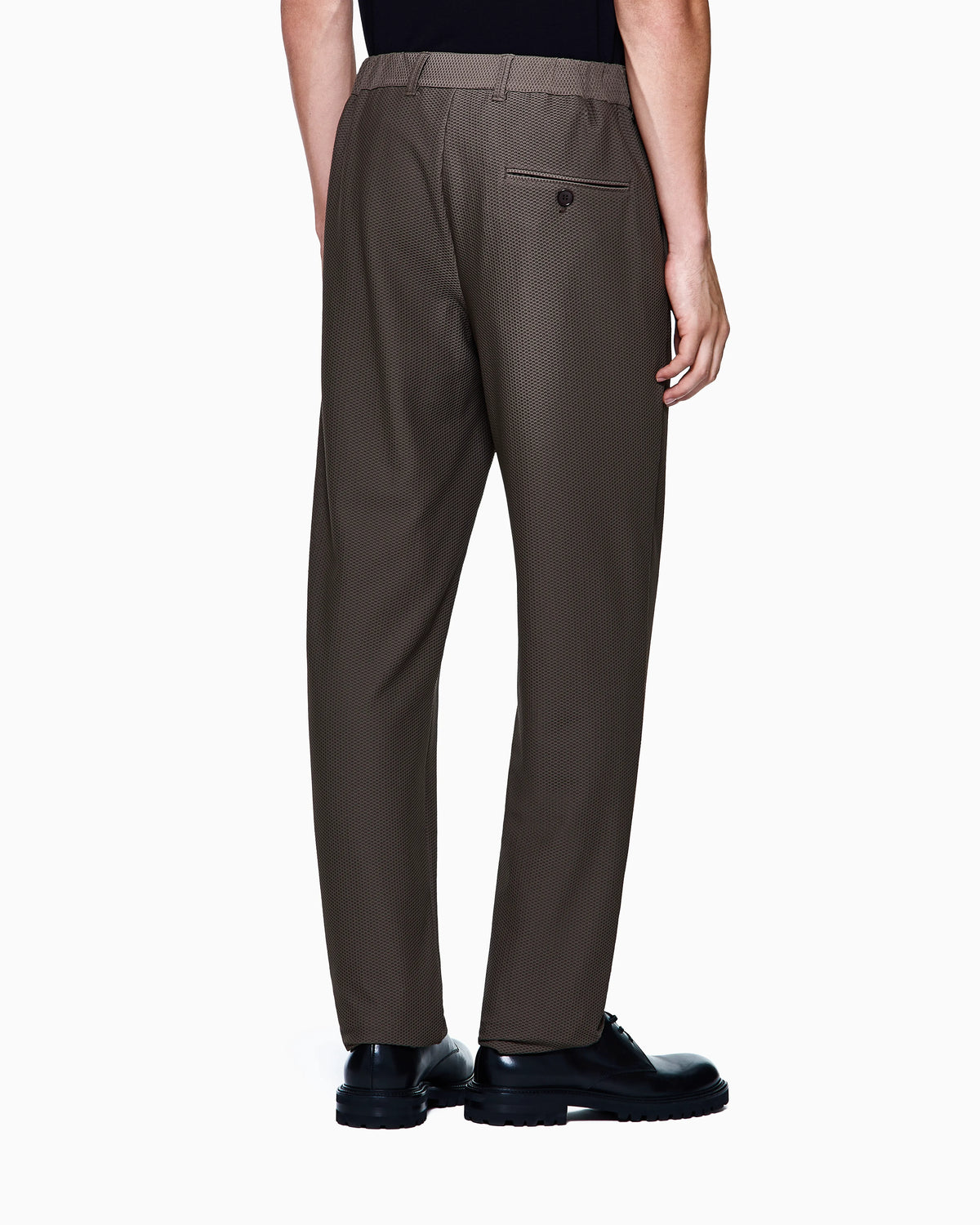Flat front trousers in a technical gaufré honeycomb fabric