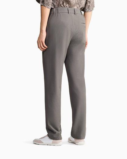 Flat front trousers in a technical gaufré honeycomb fabric