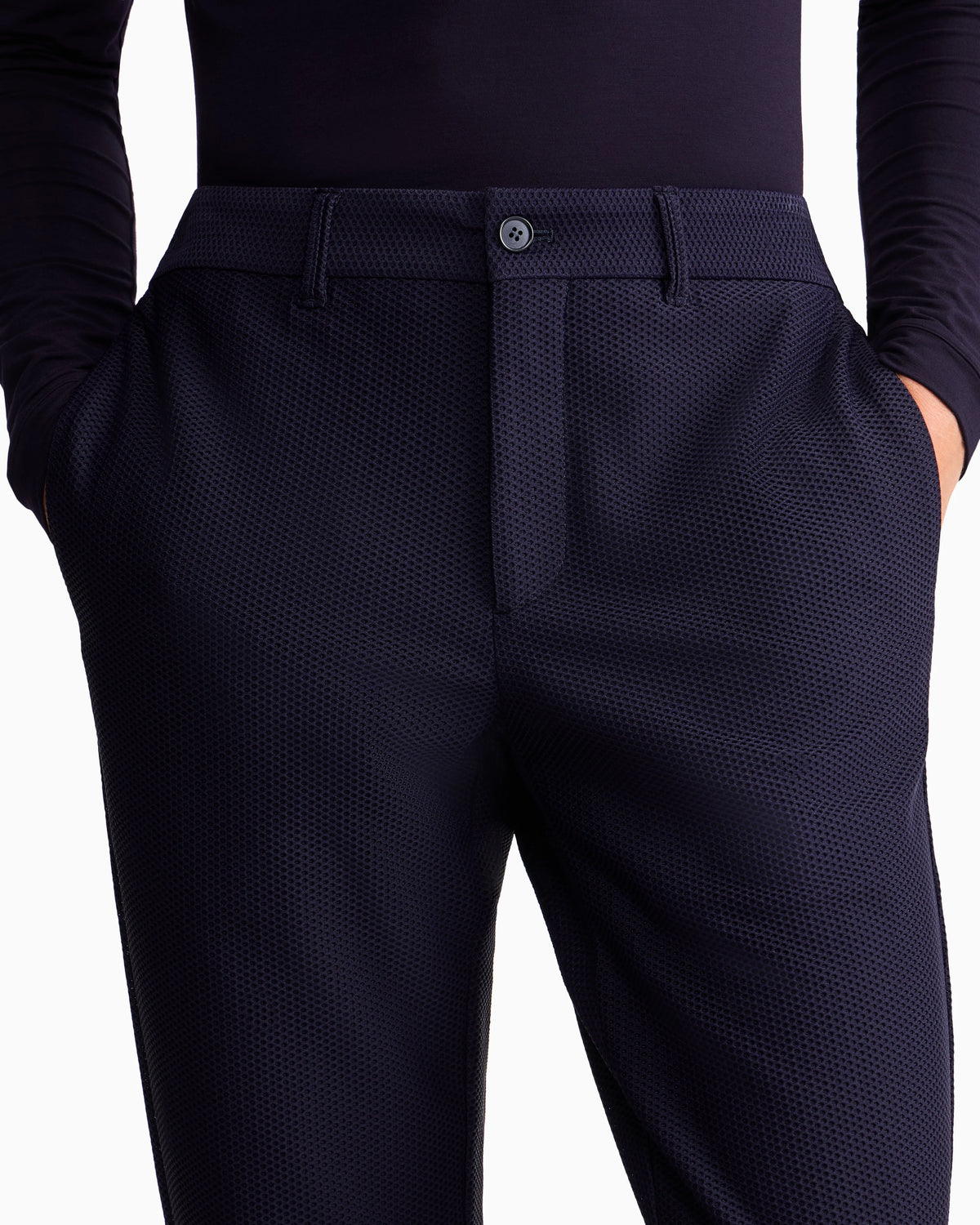 Flat front trousers in a technical gaufré honeycomb fabric