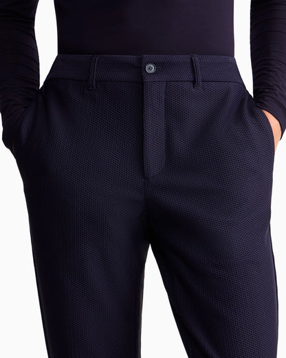 Flat front trousers in a technical gaufré honeycomb fabric