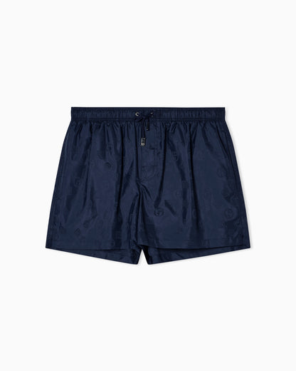 Monogram swim trunks