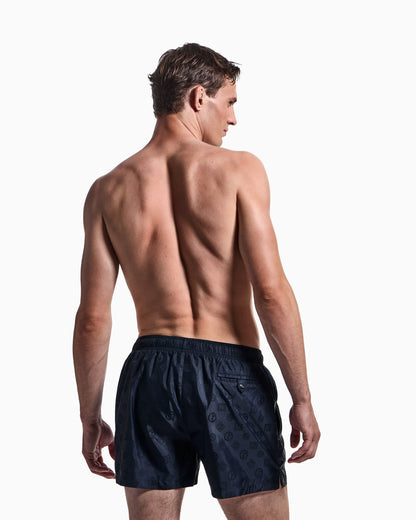Monogram swim trunks