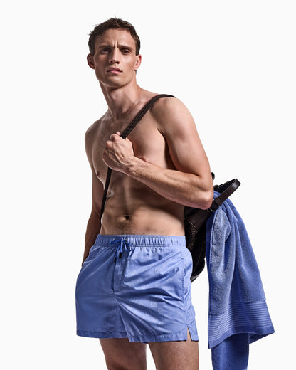 Monogram swim trunks