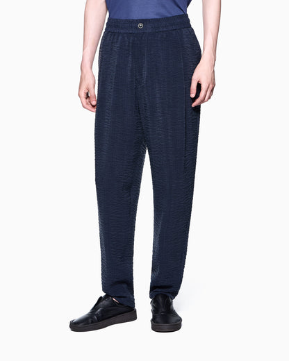 Woven trousers in cupro jacquard with drawstring