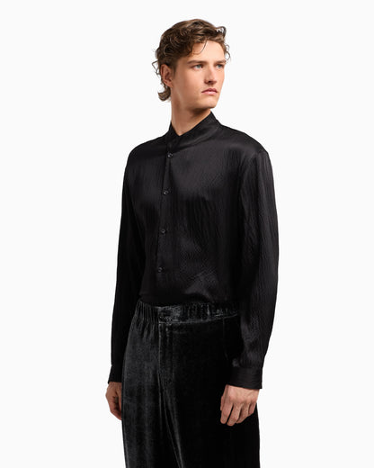 Giorgio’s satin shirt with a rhinestone detail