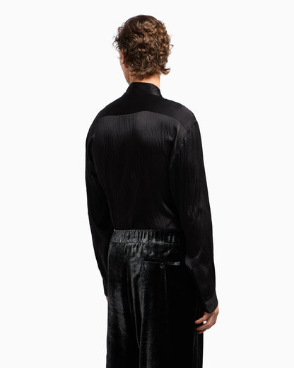 Giorgio’s satin shirt with a rhinestone detail