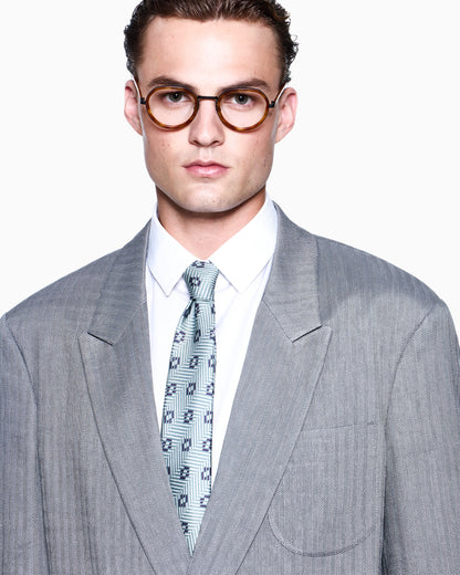 Double-breasted jacket in a viscose, linen and silk chevron