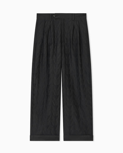 Trousers in linen blend fabric with pleats and chevron embroidery