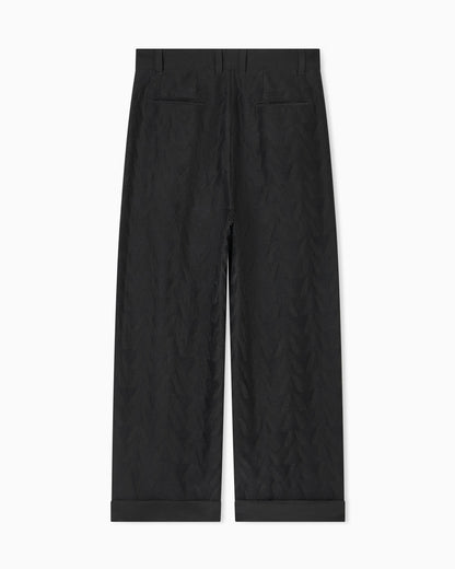 Trousers in linen blend fabric with pleats and chevron embroidery