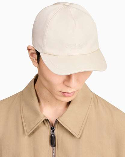 Technical fabric baseball cap with leather logo